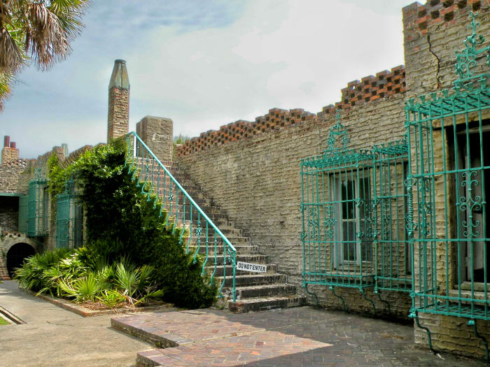 The wrought iron railings on the stairs that ascend to the roof top were designed by Anna Hyatt Huntington.