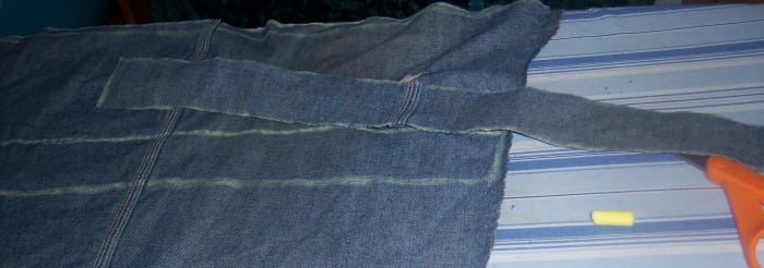 The strap. I cut first one piece, then traced that one to get the right measurement for the second.