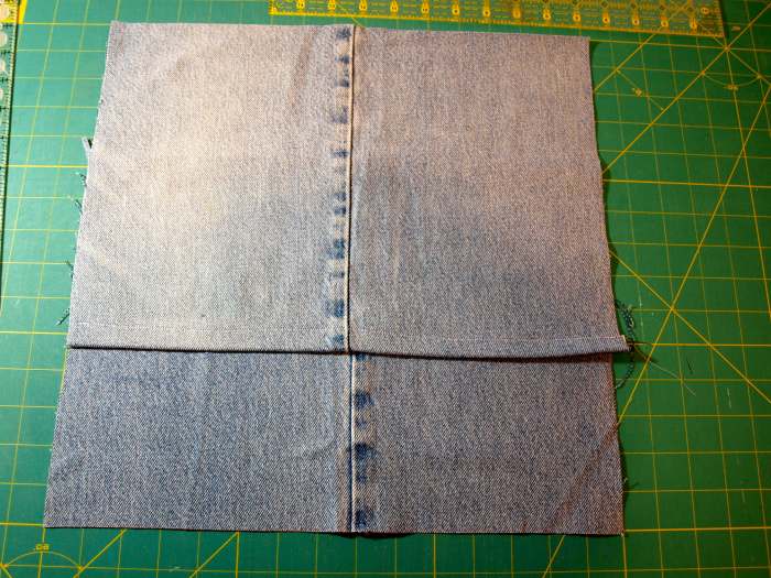 This is what the back of the pillow cover will look like. Pin on the left and right sides where the fabric overlaps.