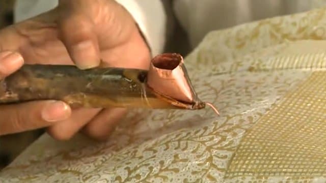 For handmade batik, first you paint your pattern with wax, then you color the fabrics and later iron out the wax.