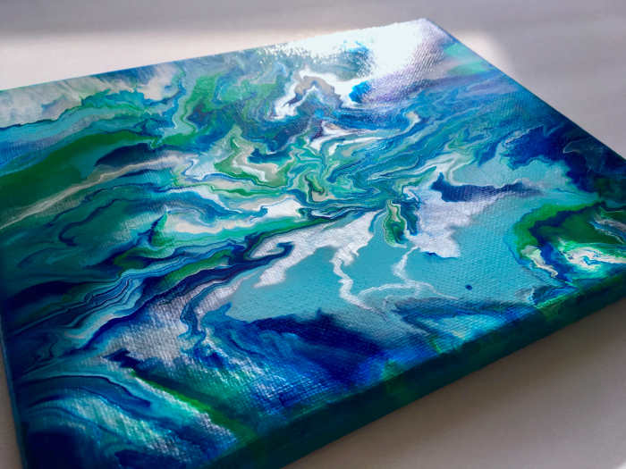 The painting dried with a glossy shine and the Iridescent Bright Silver catches the light.