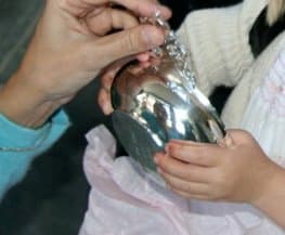 The bottom side of a porringer is a perfect place to engrave a message to the child getting baptised. The message should include the date of the Christening.