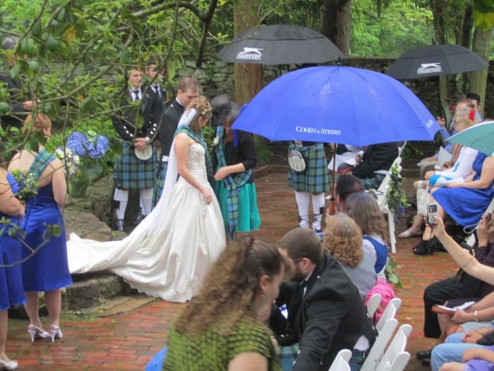 My mother-in-law placing the family tartan on me at the end of the ceremony, welcoming me into her clan.