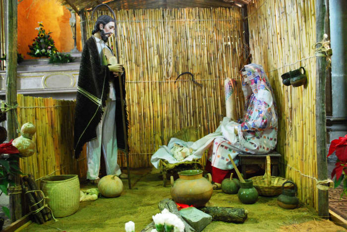 Part of a nativity scene from the Church of the Company of Jesus in the city of Oaxaca. Joseph and Mary are dressed in Oaxacan costume.