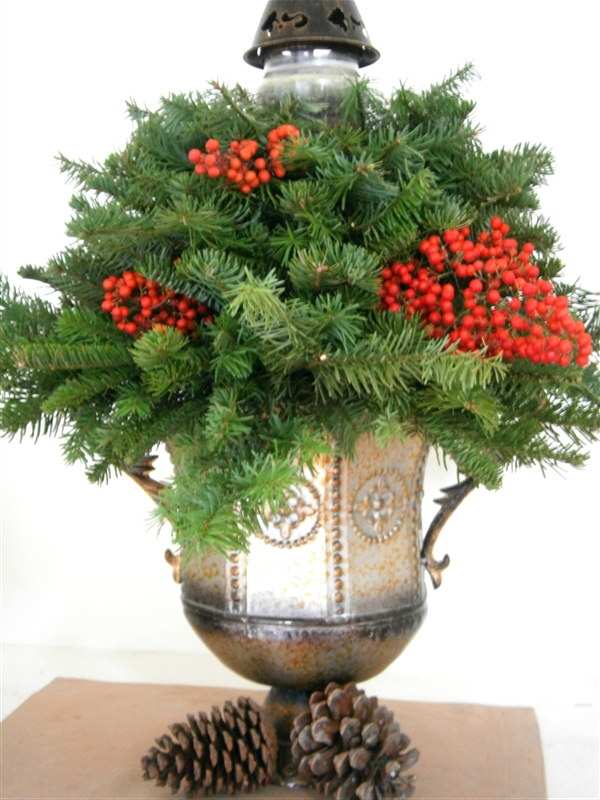 Need a Christmas tree but don't want to buy one? How about a small one, built entirely from free noble firs? The only cost incurred--the candle in a jar and floral foam--well below $10.