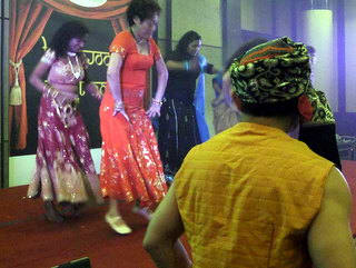 Photo 7: Bollywood Dance performance by one of the team competing for the Bollywood Dance competition