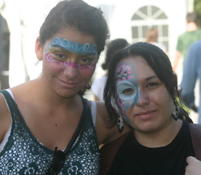 These two women made the day (a celebration of the Japanese New Year) right for them. Some people may say face-painting is for kids, but these two know what makes them happy!