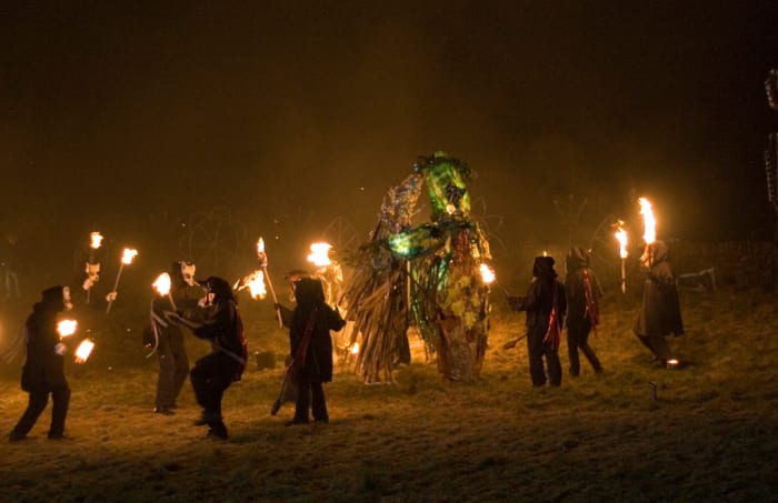 Imbolc, which has been celebrated for thousands of years, is still celebrated today. This photo is from Marsden, West Yorkshire, England, in 2005. People dance with torches around the Green Man, who is fighting Jack Frost to bring Spring from Winter.