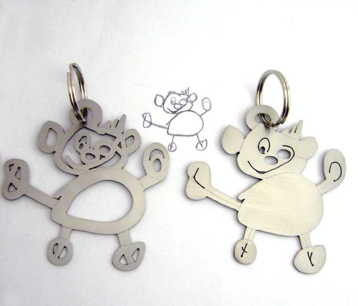 Moms can turn their little ones' doodles into keepsake key rings using polymer clay. What a clever DIY gift for Father’s Day.