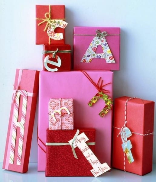Simple, quick, & creative ideas for gift wrapping. Try using the letter of the recipient's first name as a personalized name card!