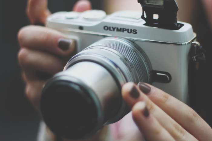 Whether you hire a friend or a professional, invest a little in a few newlywed shots. They'll be important to you later on.