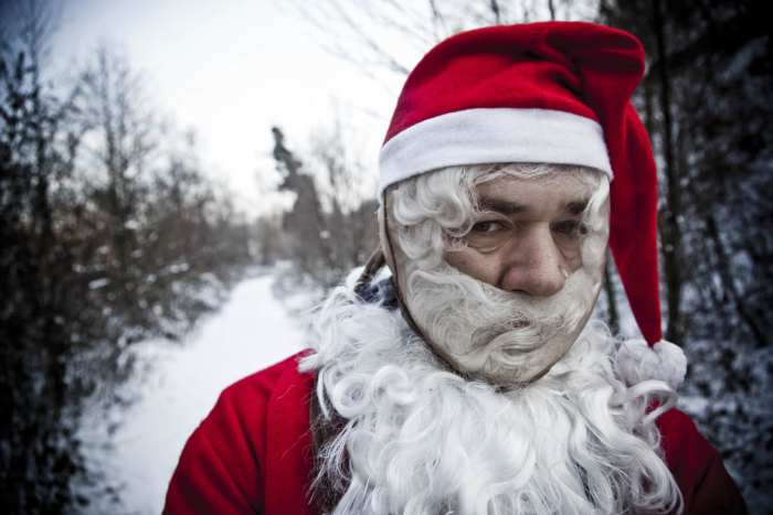 Is this Santa mad because he's been denied entry? Did he get stuck in a chimney? What's his problem?