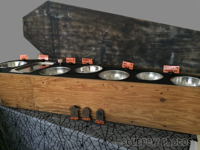 We made a buffet tray for the inside of our decorative coffin. It's perfect for serving creepy food at our Boo Bash!