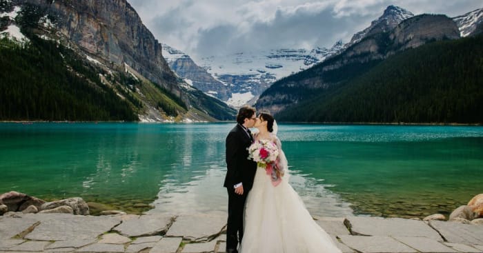 The emerald waters of Lake Louise and the Canadian Rockies at the background is truly breathtaking....