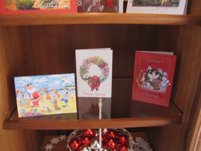 I love getting Christmas cards and hate to toss out the pretty ones after the holiday season. Some cards are saved to display again. I do this with my collection of Australian cards from my friends Down Under.