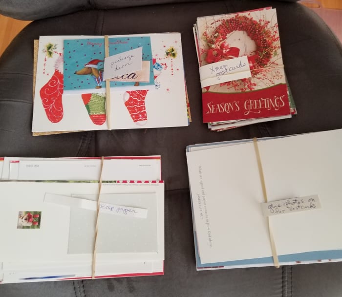 I save the ones with plain backs and glue my own photos on the side where the verse and signature is. The plain back becomes the part of a postcard where you write the address and message. PRESTO! Customized postcards to use throughout the year.