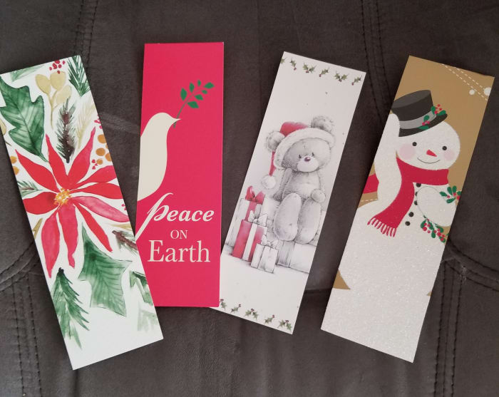 I suggested this to my public library and they received bags and bags of cards from library users. Volunteers turned them into bookmarks. These were stacked by the checkout desk for people to take.