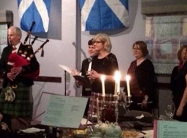 A Village Voices choir singing a selection of Robbie Burns songs at a Burns' Night supper, 2018.
