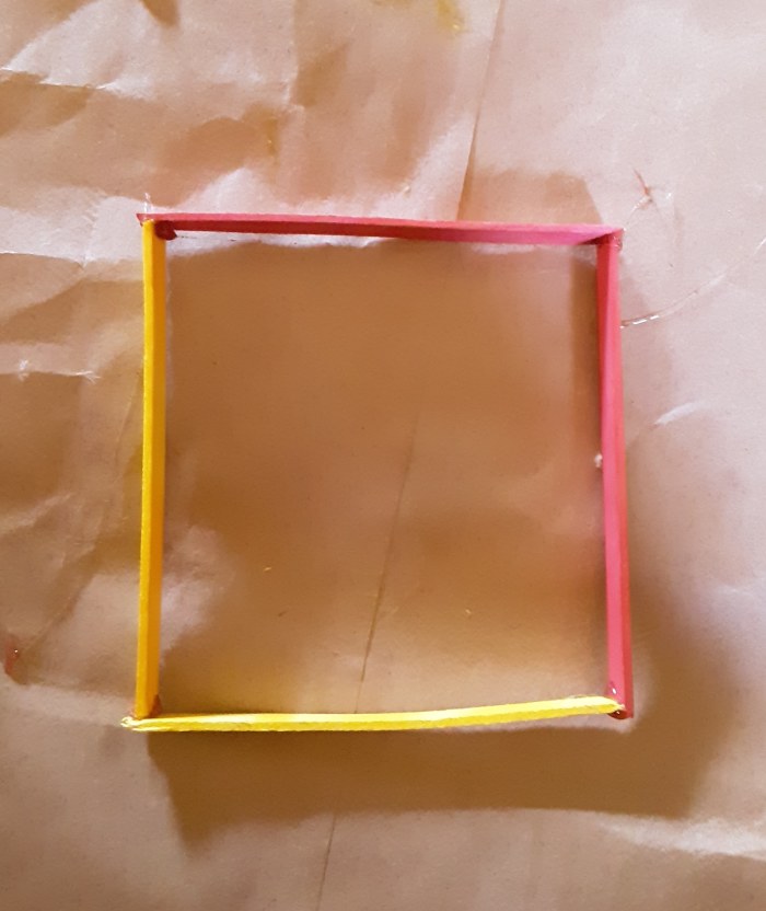 Be sure to glue frame together. I trimmed the edges of the popsicle sticks off for the bottom frame.