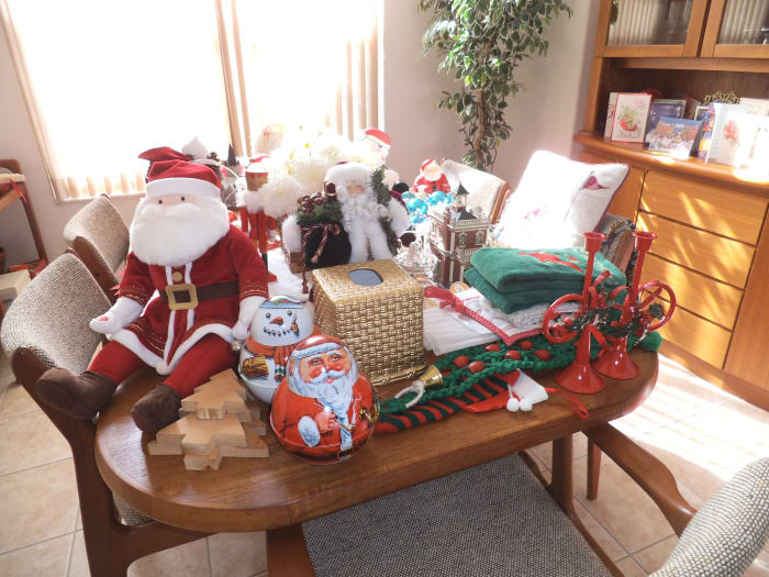 I make a big mess while decorating, and later undecorating, but it sure is festive when it is all in place.