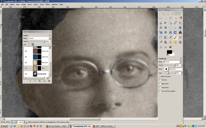 Change the paintbrush to black to erase areas that should not be the chosen layer color. For example, the eyes and glasses will have to be "erased" from the beige color.