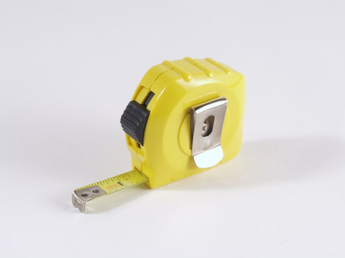 Wireless G is rated at approximately 150 feet interior range. Wireless N is rated at approximately 300 feet interior range.