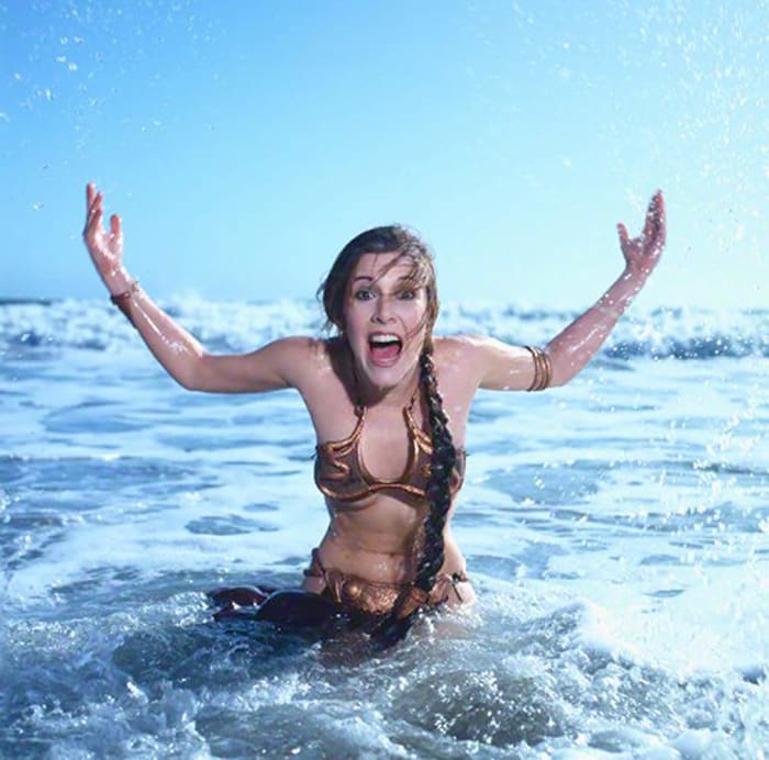I don't know if it's inappropriate to include a photo of Fisher in a bikini to pay respects, but this picture shows her with such a fun and joyful spirit that it's hard not to be totally charmed by her in it. Rest in peace, Carrie Fisher.