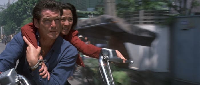 Yeoh (back) demonstrates that Bond girls needn't just be eye candy, getting involved and playing a vital part