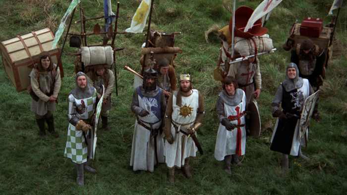 Chapman (centre) leads the Python boys on a magnificent medieval quest to find the Holy Grail... possibly.