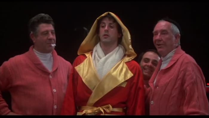 Meredith (right) puts in a memorable performance as Rocky's trainer, despite still sounding like his famous Penguin in the Batman TV show of the 1960s.