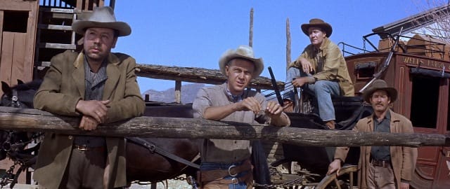 McQueen (centre) also became a major star after the film, thanks to his natural charisma and habit of upstaging Brynner.