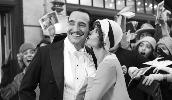Dujardin (left) and Bejo (right) perfectly encapsulate the inherent glamour and style of pre-talkie movie stars and lend the film a startling credence.