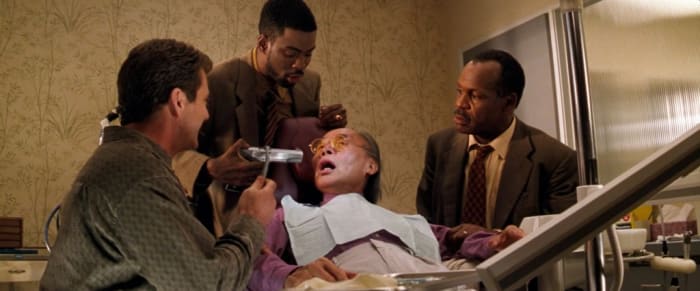 Rock (centre) adds nothing to the film besides yet another character to an increasingly one-sided police force.