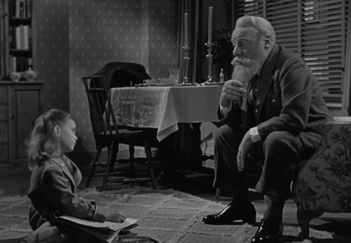 The relationship between Wood (left) and Gwenn (right) feels natural and underscores Gwenn's perfect portrayal of Kris Kringle.