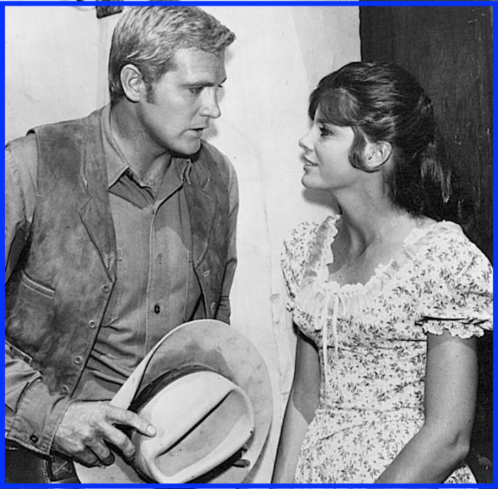 Robert Redford and Paul Newman weren't the first cowboys to fall under Katharine Ross' spell. Here she appears with Lee Majors in a guest appearance on the TV series Big Valley.