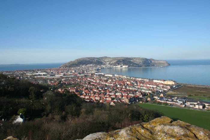 Photo taken from the 'Little Orme' - photo shows the town of Llandudno, it's North and West Short and the mighty Great Orme in the distance.