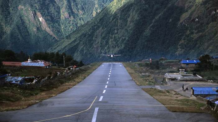 The runway at Lukla airport has a gradient of 12 percent and when planes take off, they plunge downhill off a 2,000-foot cliff!