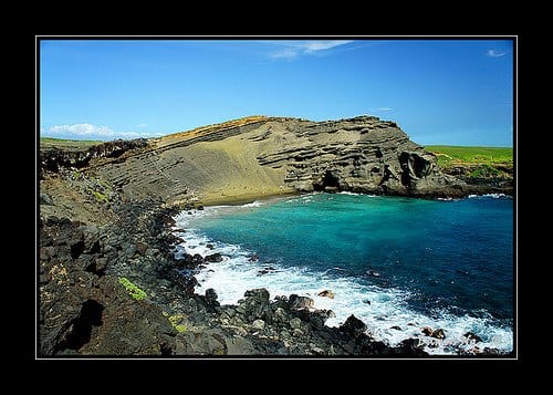 Green Sand Beach has the most beautiful rock formations in the world. The green color comes from olivine, a mineral found by volcanoes.