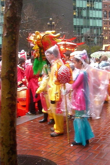Rain or shine, the festival will go on! And the street vendors make a fortune out of selling those rain ponchos.