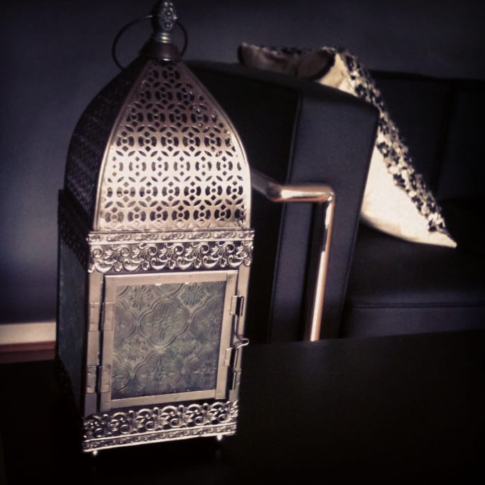 Whether they're situated inside or outside- A Morrocan Lantern can really add a Moorish charm to a room- Whether it's a bachelor pad (pictured) or family home
