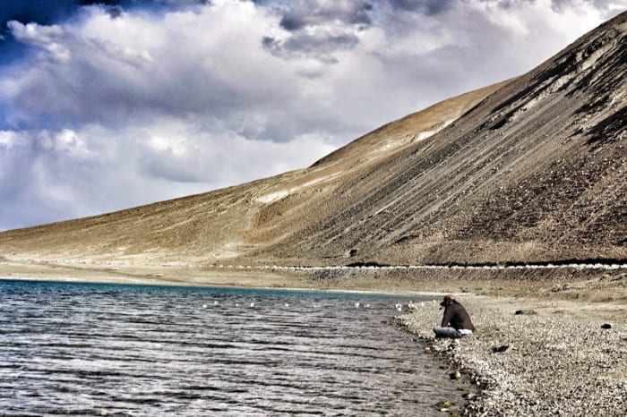 Sitting by The Pangong Tso is such a sublime experience that words fall short of meaning.