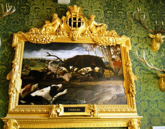 Chambord is filled with evidence of royal hunting conquests: stuffed game, antlers, and artwork depicting the hunt. The wall surrounding the castle made it more of a "canned" hunt.