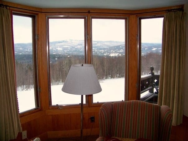 View from the guest house. If you enjoy sledding there is a nice hill right out back that travels all the way to the woods. Also, notice the mountains in the distance.