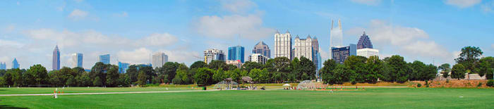 Atlanta skyline as seen from Piedmont Park. Photo by david.cole, courtesy photographer and Wikimedia Commons.