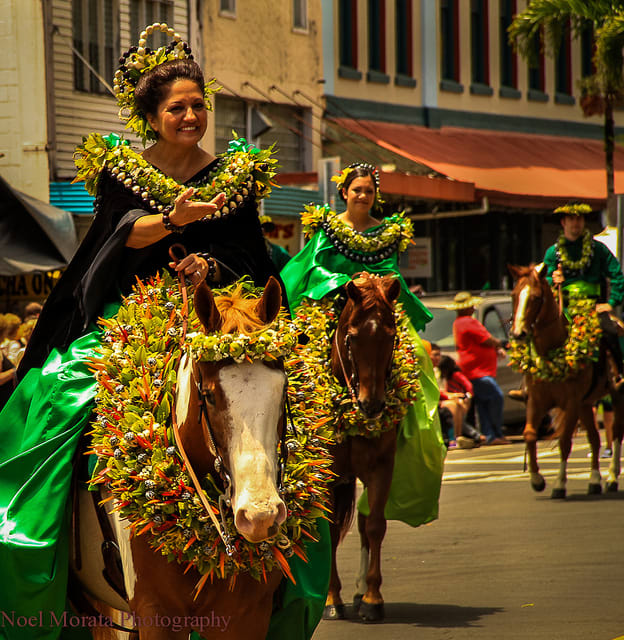 Pā‛ū rider from Moloka'i. Moloka'i's color is green and its flower is the pua kukui. Check out the horse!