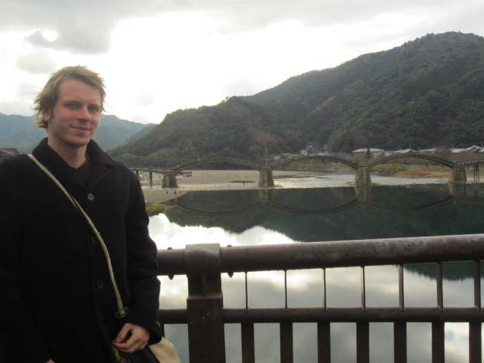The author of this article, Ciaran, standing beside Kintai bridge, a Japanese national treasure and popular tourist destination.
