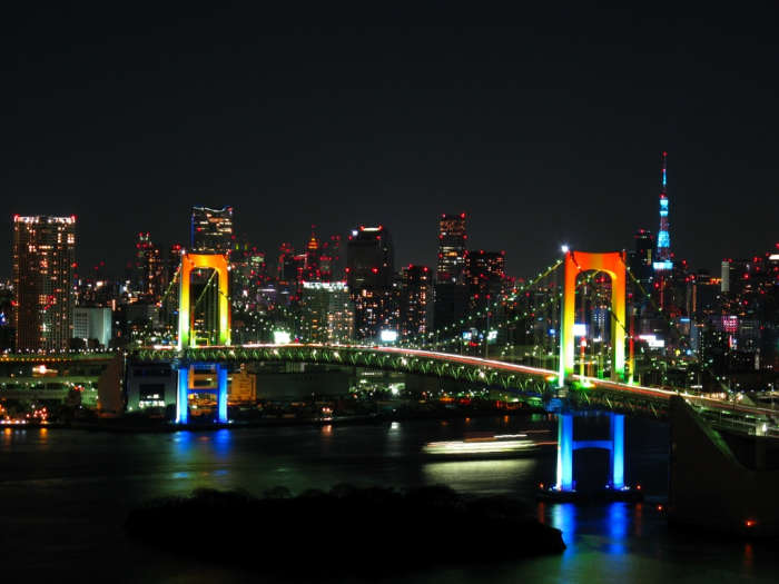 Displaying its namesake, rainbow bridge is illuminated at night using red, green and white lamps, powered by solar energy obtained each day.