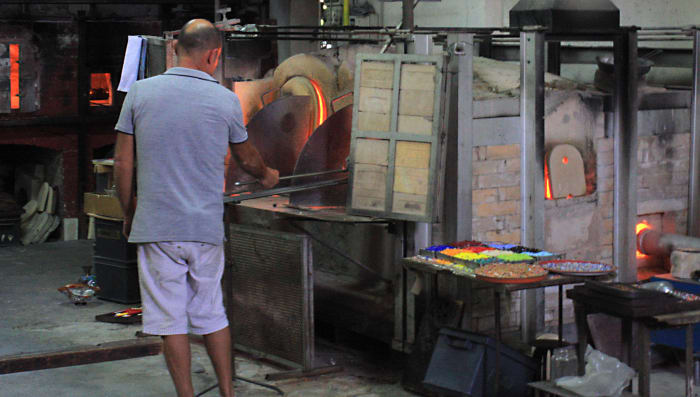 Another glass factory - another furnace. Note the tray of pigments which give Murano glass its distinctive and sometimes extravagant colours