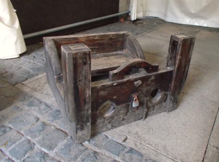 A set of stocks in the rear yard of the museum, used to punish trouble-makers!
