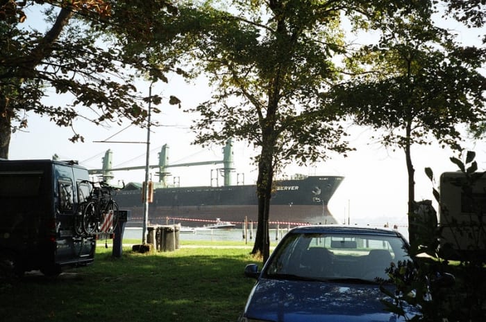 A freighter in the Veneta Lagoon north of the city of Venice passes near the Camping Fusina, one of the campgrounds on the mainland.